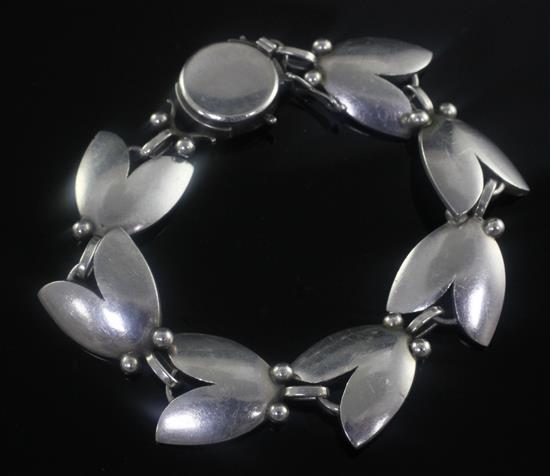 A 1950s Danish Georg Jensen sterling silver tulip bracelet, design no. 93, 7in.